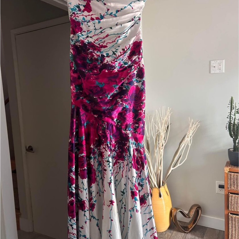 Satin strapless stunning gown . Worn once like new .